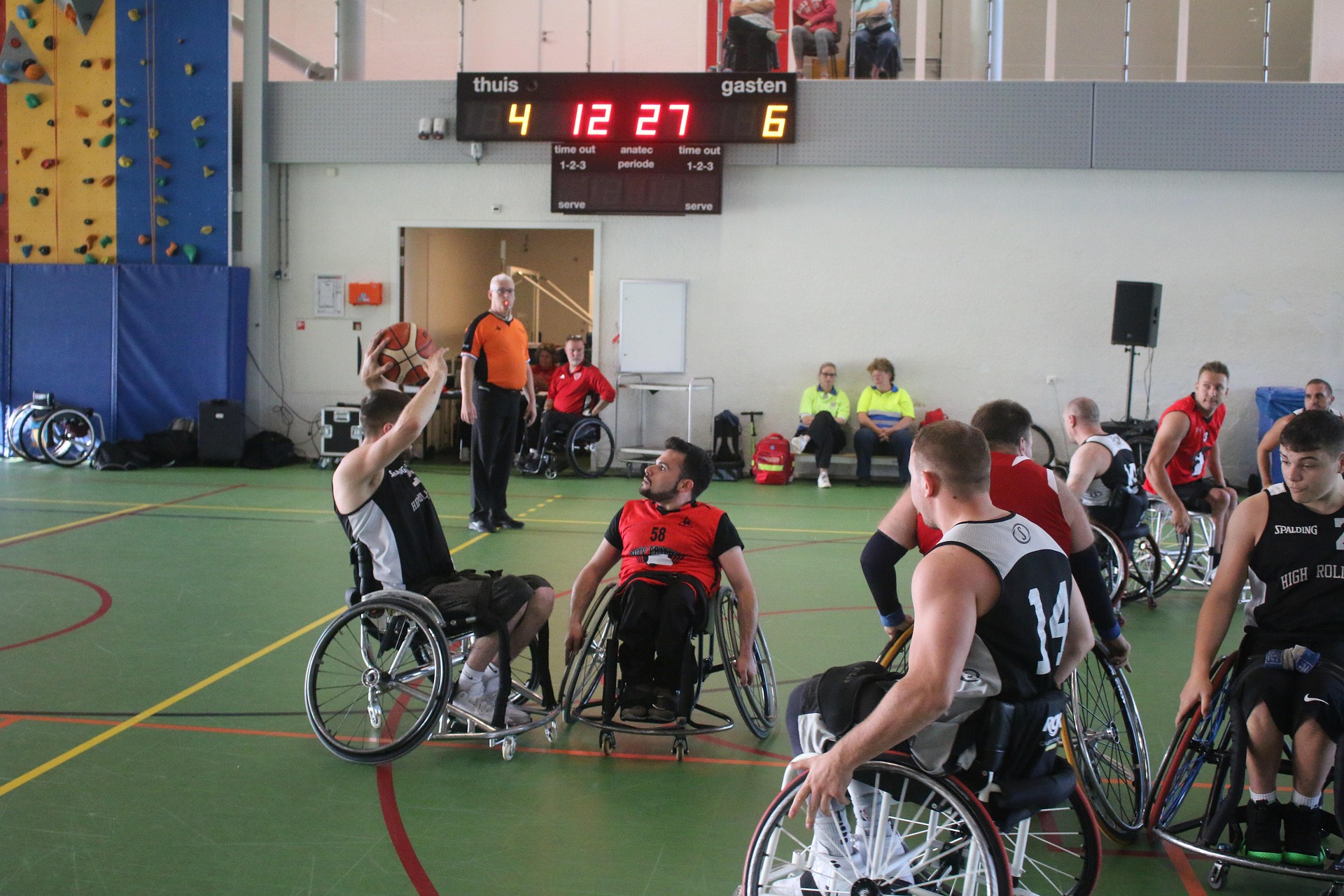 At a basketball game event organised for disabled person.